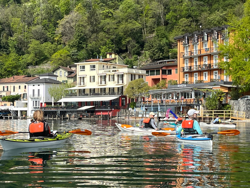 Kayakers on Lake Lugano, Switzerland. 