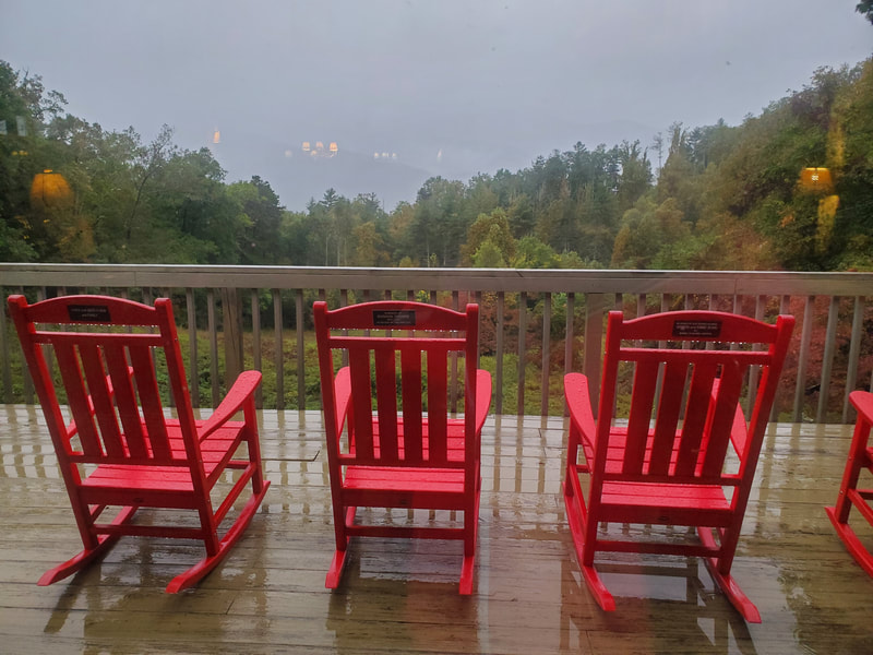 Rocking chairs on deck in smoky mountains